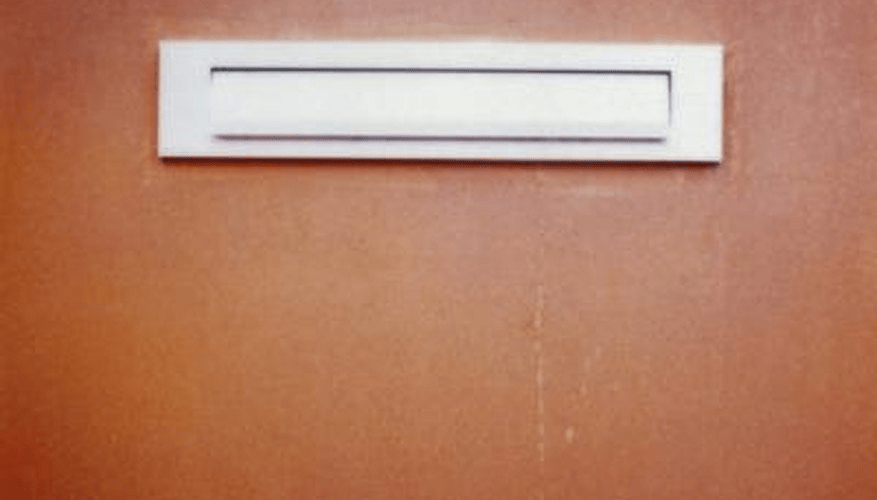 Install mail slot in metal door