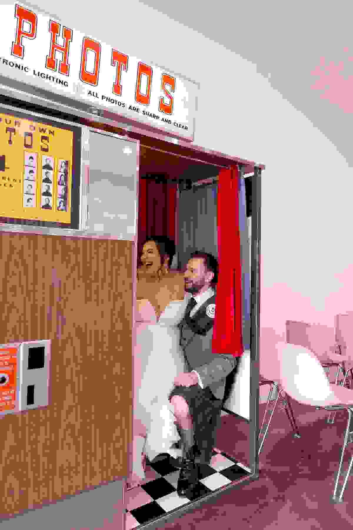 Newlywed couple posing outside Sure Thing Chapel in Las Vegas before their themed wedding ceremony.