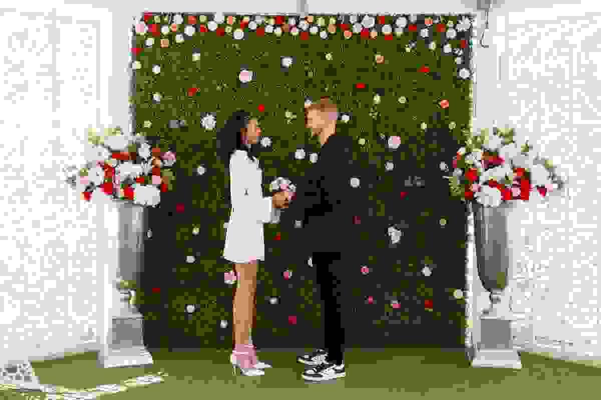 Bride and groom inside the Little White Wedding Chapel during their ceremony