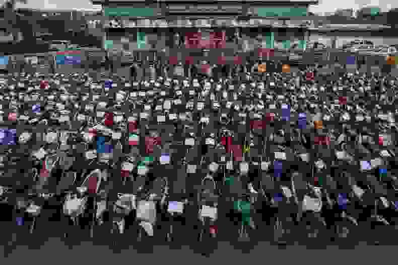 Impounded motorcycles fill a parking lot at Provincial Police Region 1 headquarters in Bangkok. They were seized from illegal street racers. (File photo: Pattarapong Chatpattarasill)  Please credit and share this article with others using this link: https://www.bangkokpost.com/thailand/general/2512684/people-urged-to-report-street-races-for-b3-000-reward. View our policies at http://goo.gl/9HgTd and http://goo.gl/ou6Ip. © Bangkok Post PCL. All rights reserved.