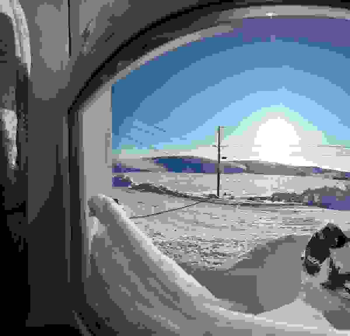 The view from a snow filled window in Kangirsuk, Arctic The view from a snow filled window in Kangirsuk, Arctic