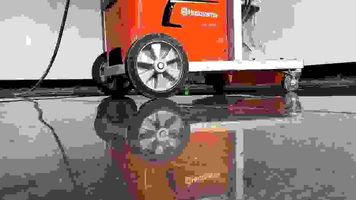 Concrete floor polishing result with grinder reflection after diamond tooling workflow Concrete floor polishing result with grinder reflection after diamond tooling workflow