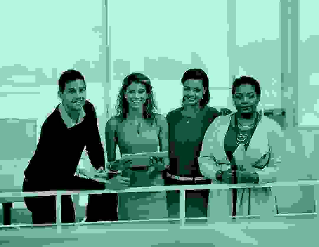 Team of lawyers collaborating around a conference table in a modern office Team of lawyers collaborating around a conference table in a modern office