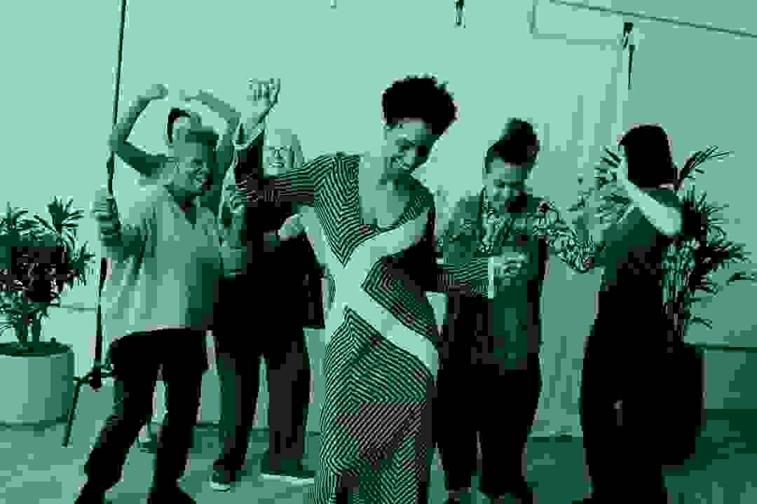 Visual artist showcasing artwork in an art gallery setting Visual artist showcasing artwork in an art gallery setting