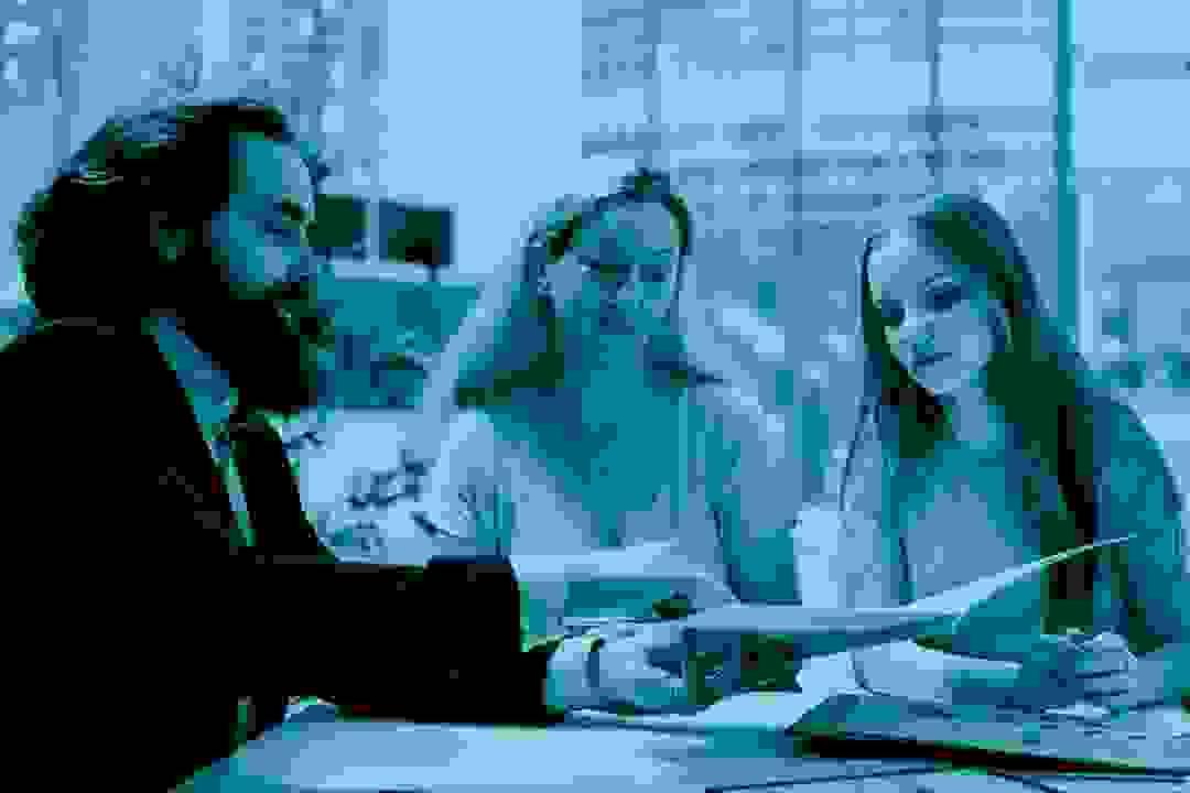 Attorney consulting with a client, representing criminal and family law practice areas Attorney consulting with a client, representing criminal and family law practice areas