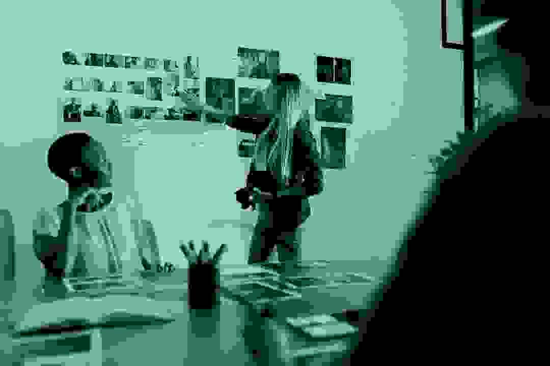 Creative professionals collaborating on multimedia and brand identity projects Creative professionals collaborating on multimedia and brand identity projects