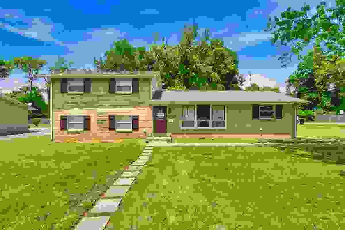 Brick split-level home on a large corner lot with green lawn and walkway at 1002 W Northfield Blvd Forest Hills Estates Murfreesboro TN Brick split-level home on a large corner lot with green lawn and walkway at 1002 W Northfield Blvd Forest Hills Estates Murfreesboro TN