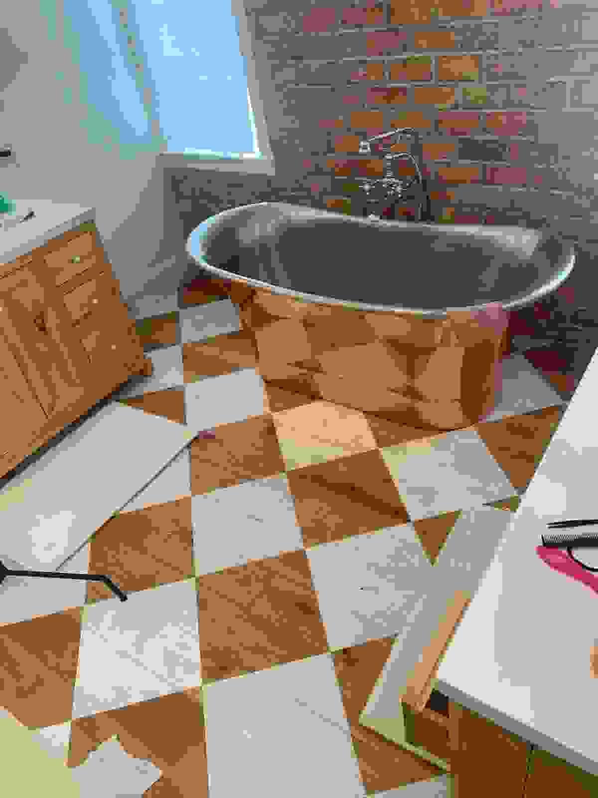 Custom wood floor repair and inlay detail Custom wood floor repair and inlay detail