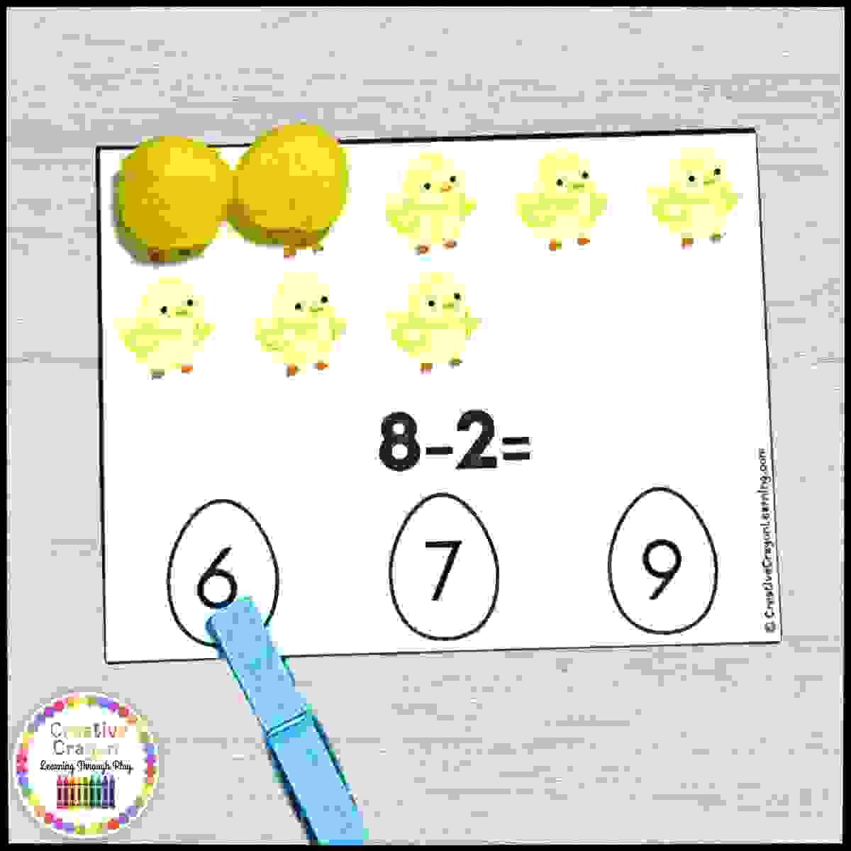 Kindergarten Easter subtraction center with chick-themed count and cover cards using numbers within 10