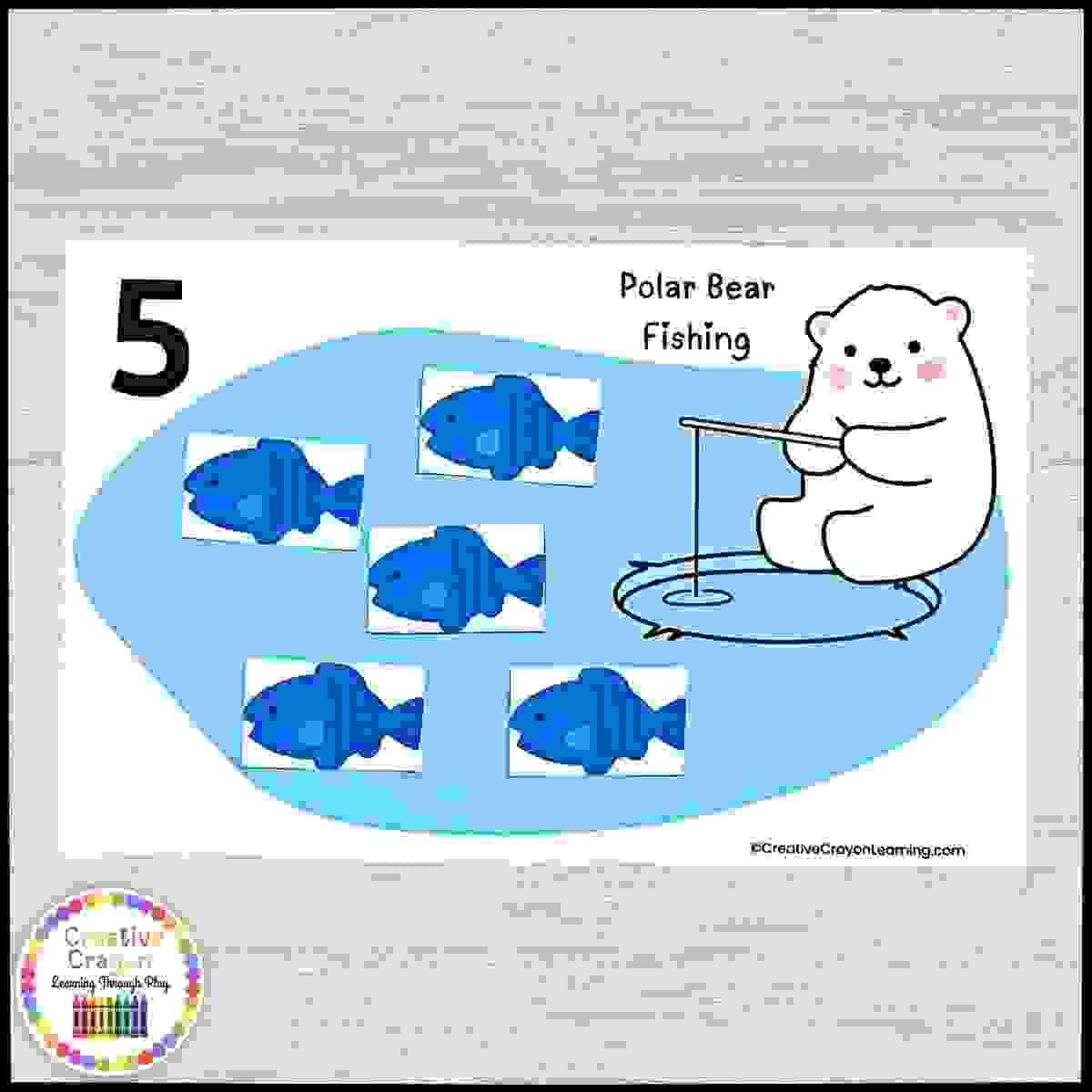 Kindergarten winter math center where students count fish to match numbers 1–20 with a polar bear theme.