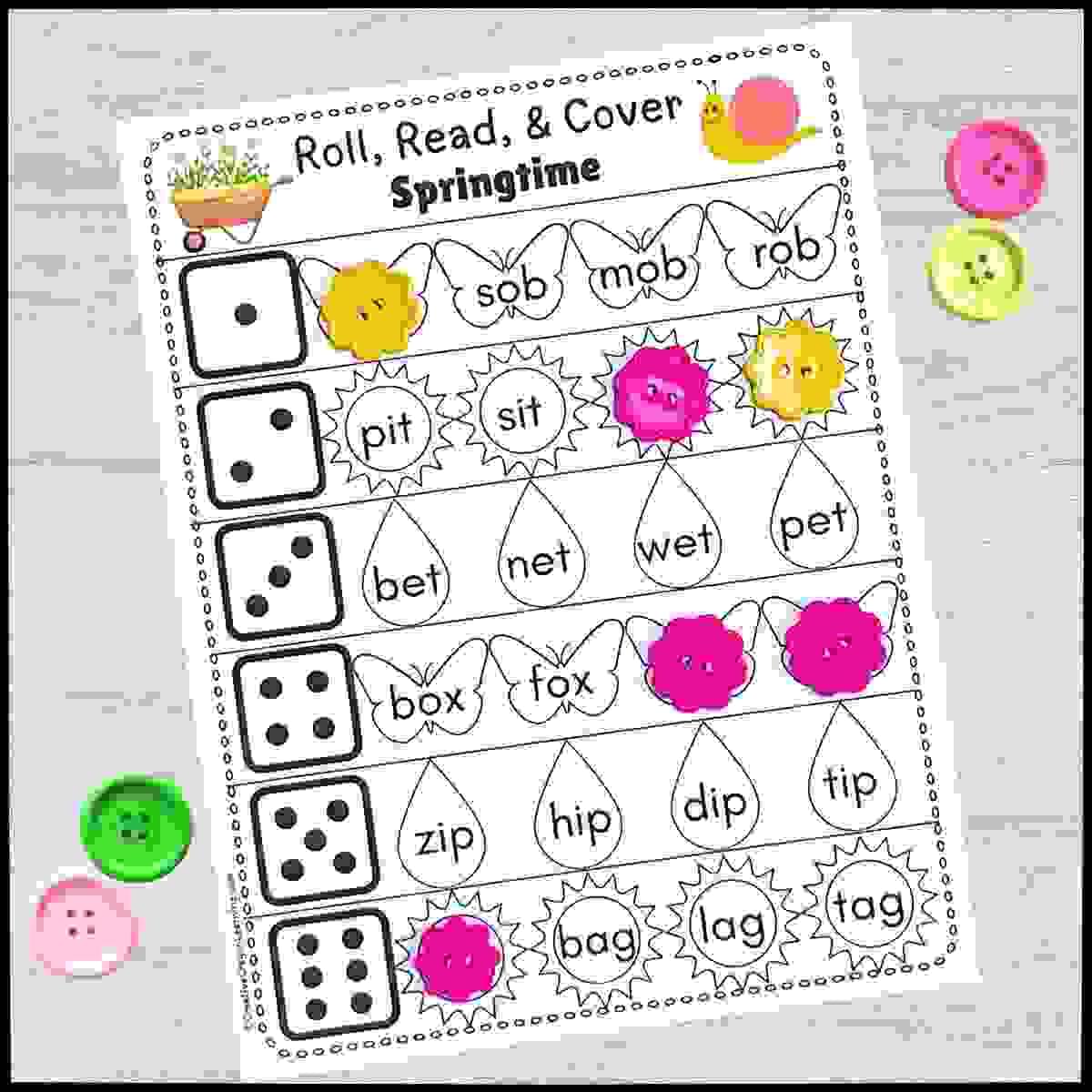 Hands-on spring CVC word reading activity with dice and cover mats for kindergarten
