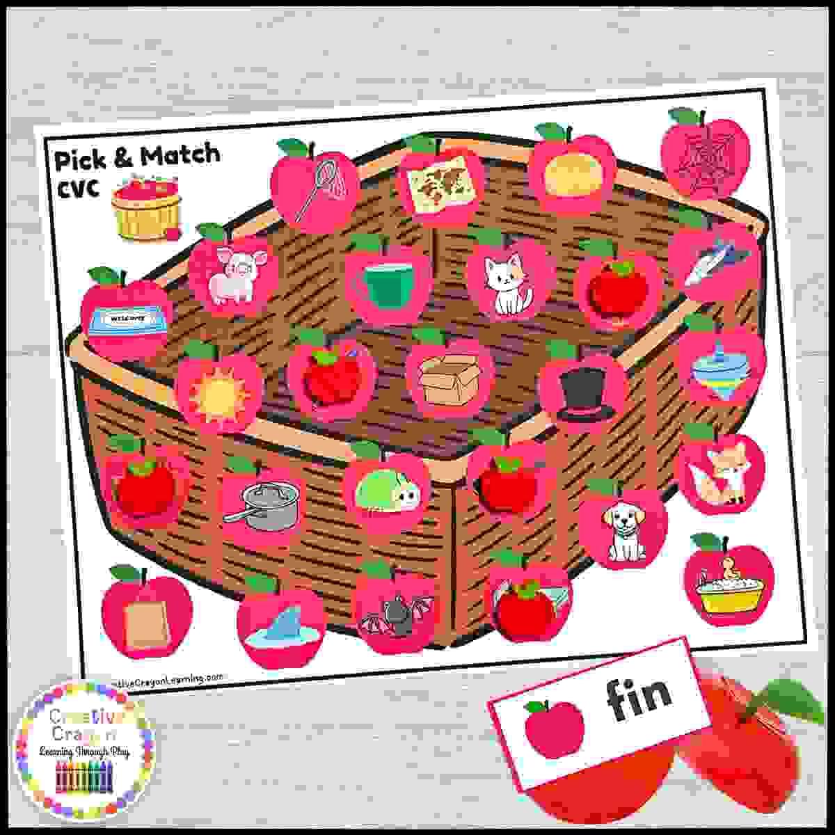Apple-themed literacy center for kindergarten with plastic apples, word cards, and matching mats.