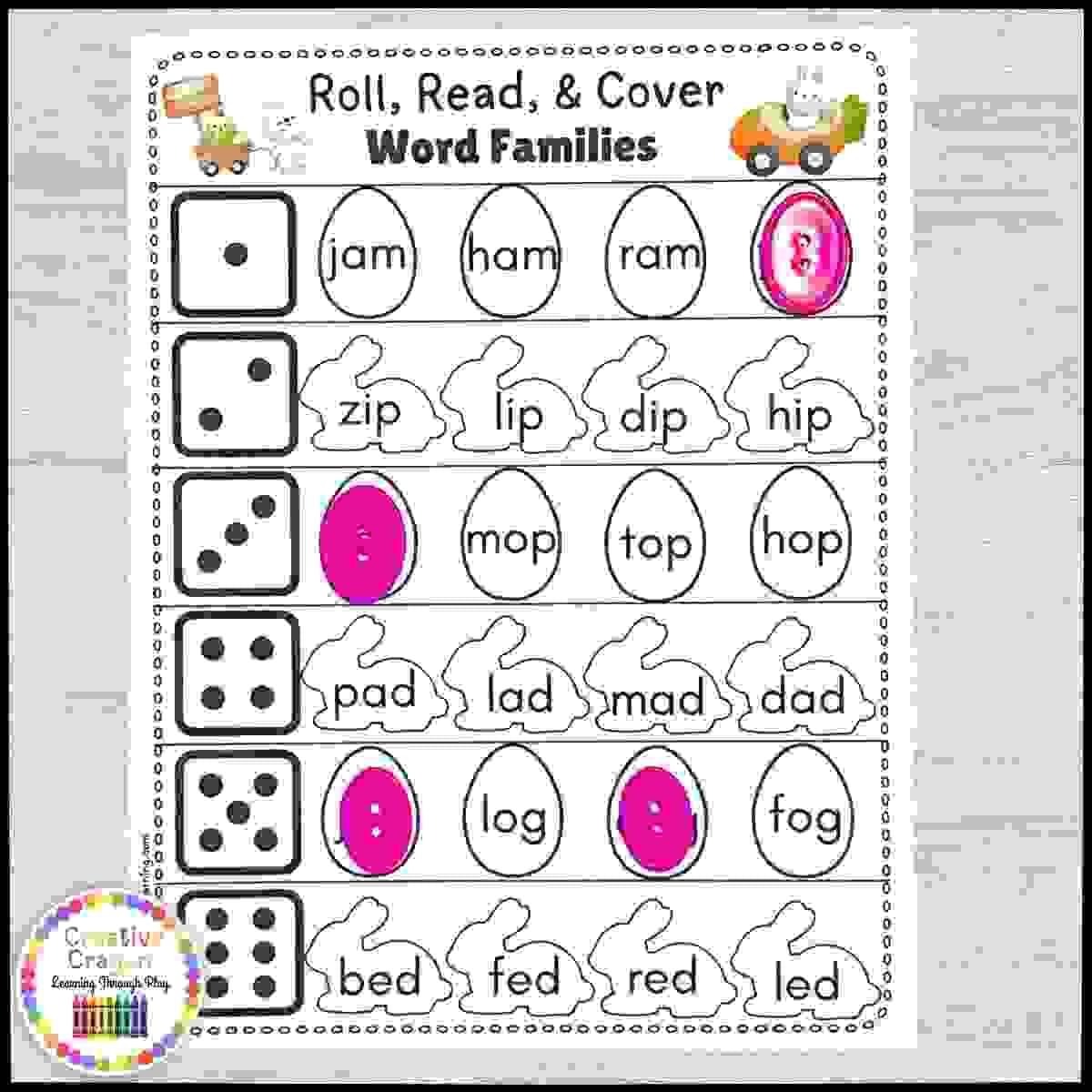 Kindergarten Easter CVC literacy activity with roll, read, and cover word mats for spring phonics fluency