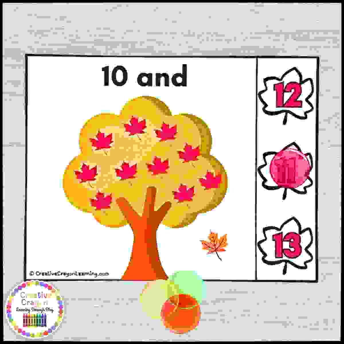Fall counting on addition center for kindergarten with leaf-themed missing addend cards and number choices