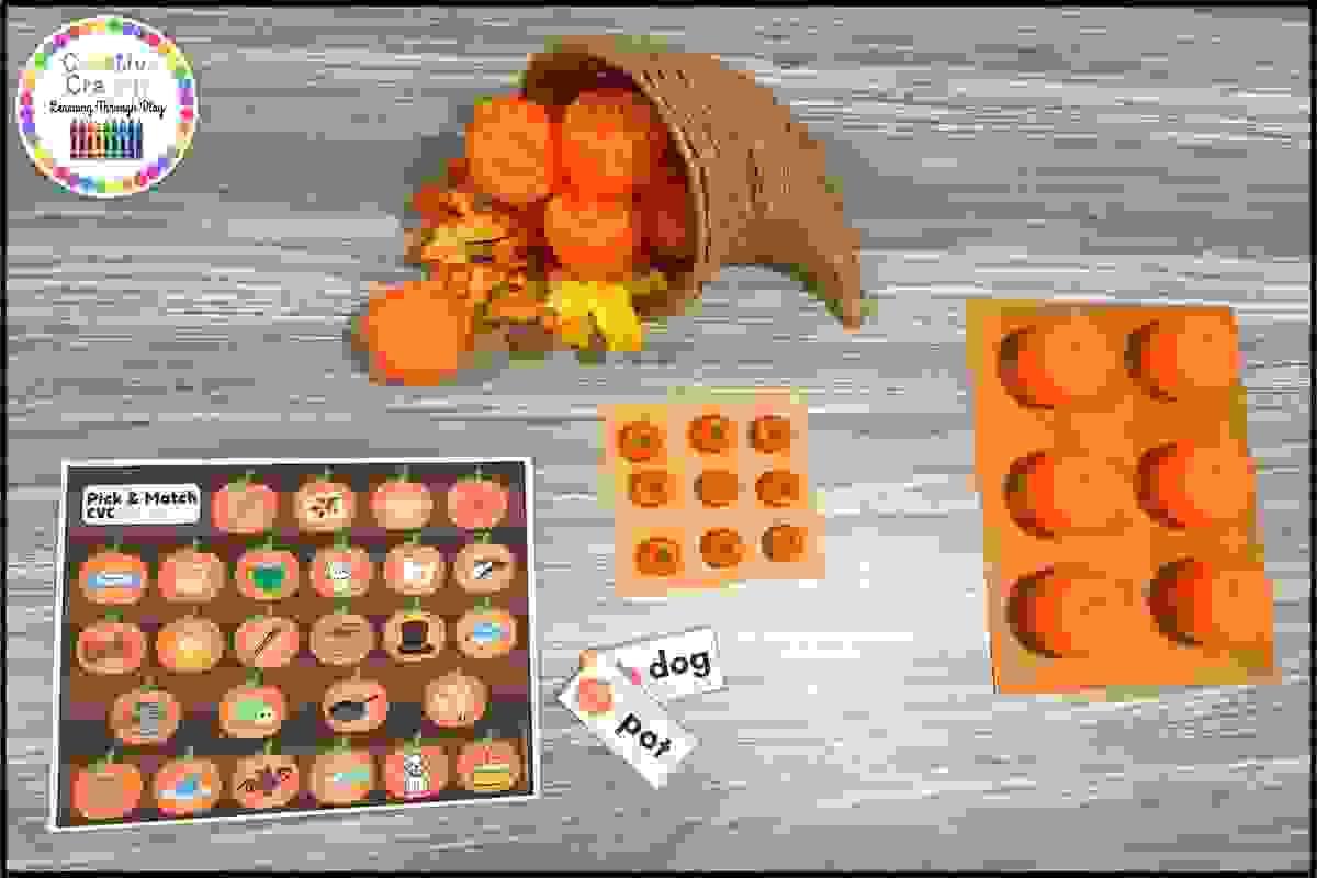 Pumpkin Pick & Match full literacy center setup for PreK, Kindergarten, and 1st grade with plastic pumpkins and phonics strips.
