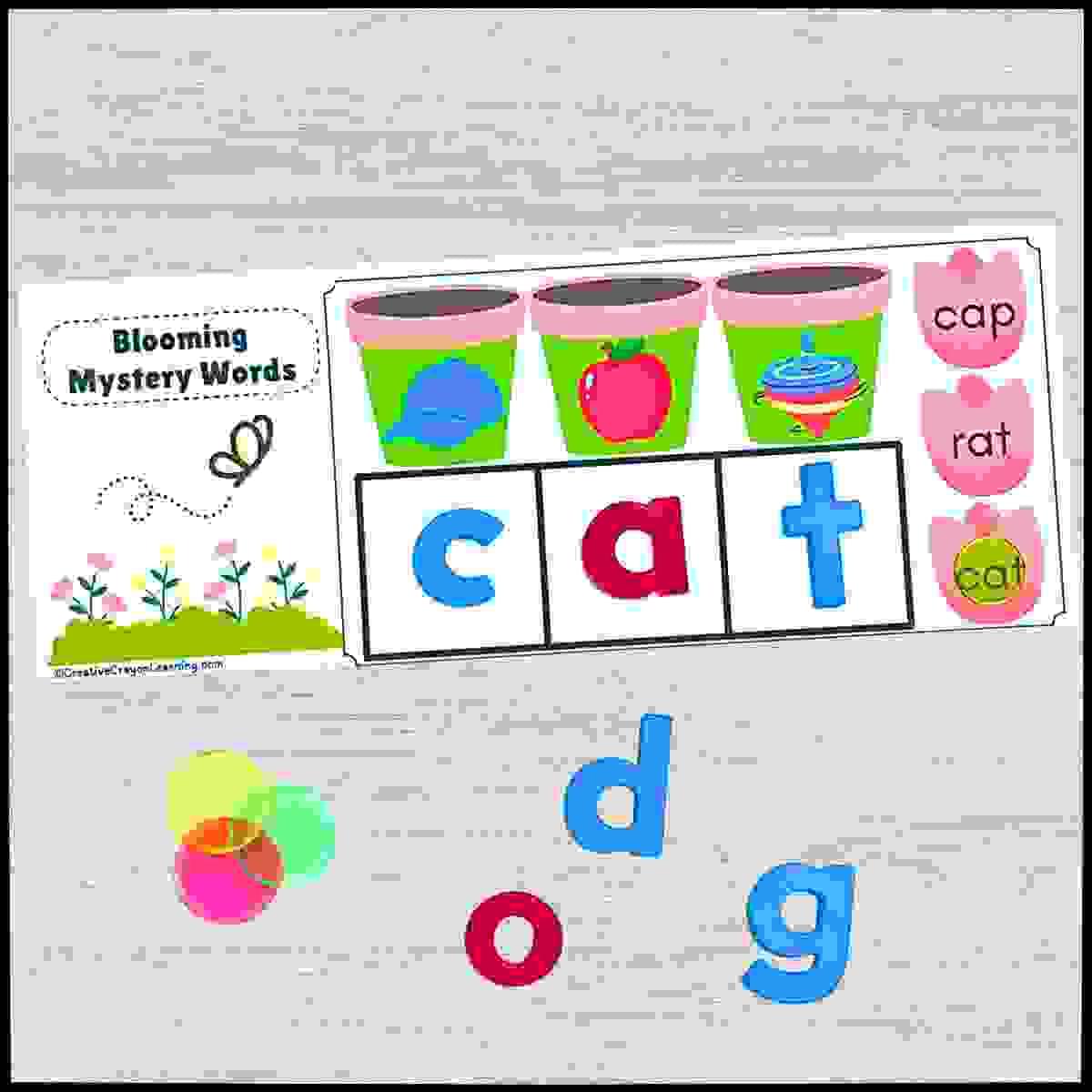Spring-themed CVC word blending center for kindergarten with picture clues and clip card