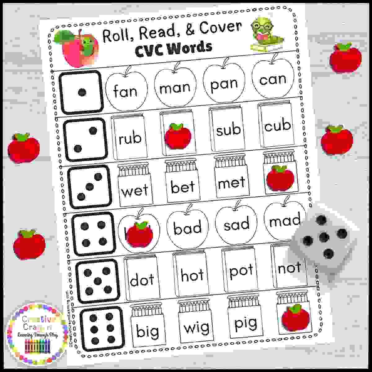 Back-to-school themed CVC word roll-and-cover literacy center for kindergarten with dice and counters.