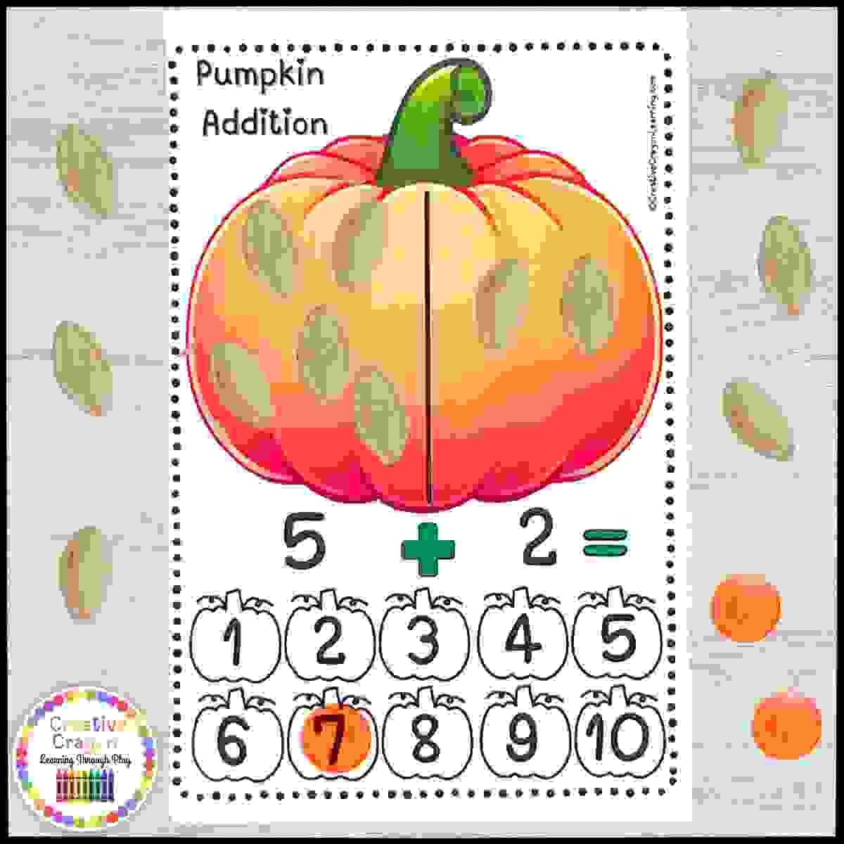 Pumpkin-themed addition center for kindergarten with manipulatives and fall counting mats