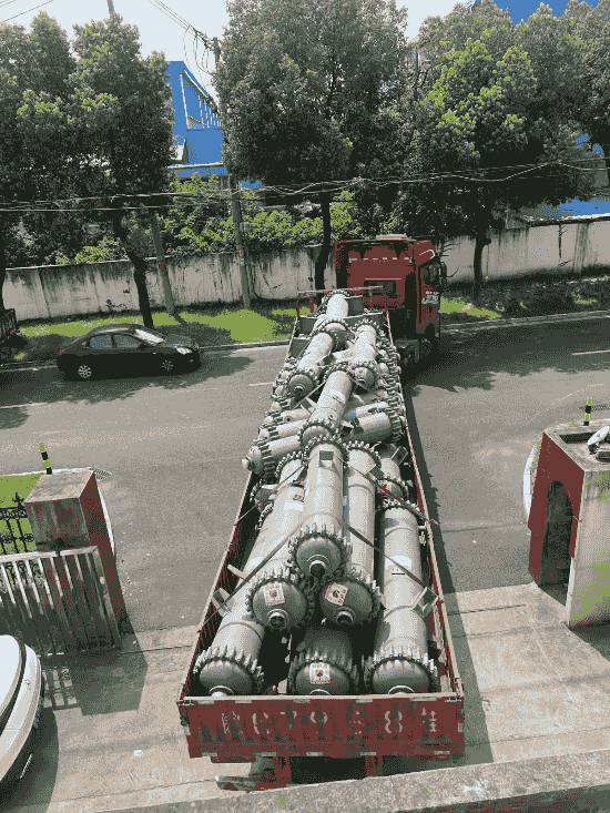 Close-up of glass-lined exchanger with protective sealing before transport.