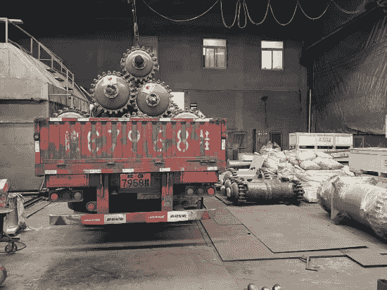 13-meter flatbed truck loaded with glass-lined and SiC heat exchangers at Wuxi Repicea loading area.