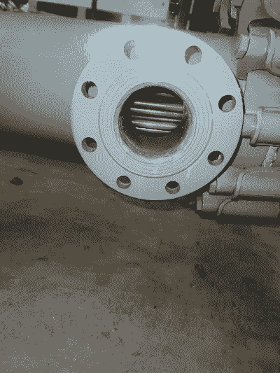 One-piece steel-lined molded PFA tube sheet installed on condenser