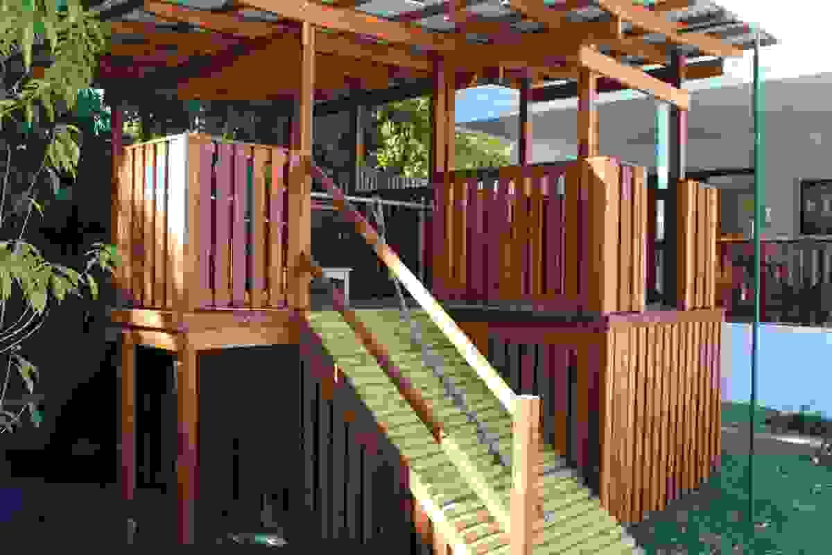Gazebo with jungle gem for the kids or grandkids, surrounded by trees in Roanoke