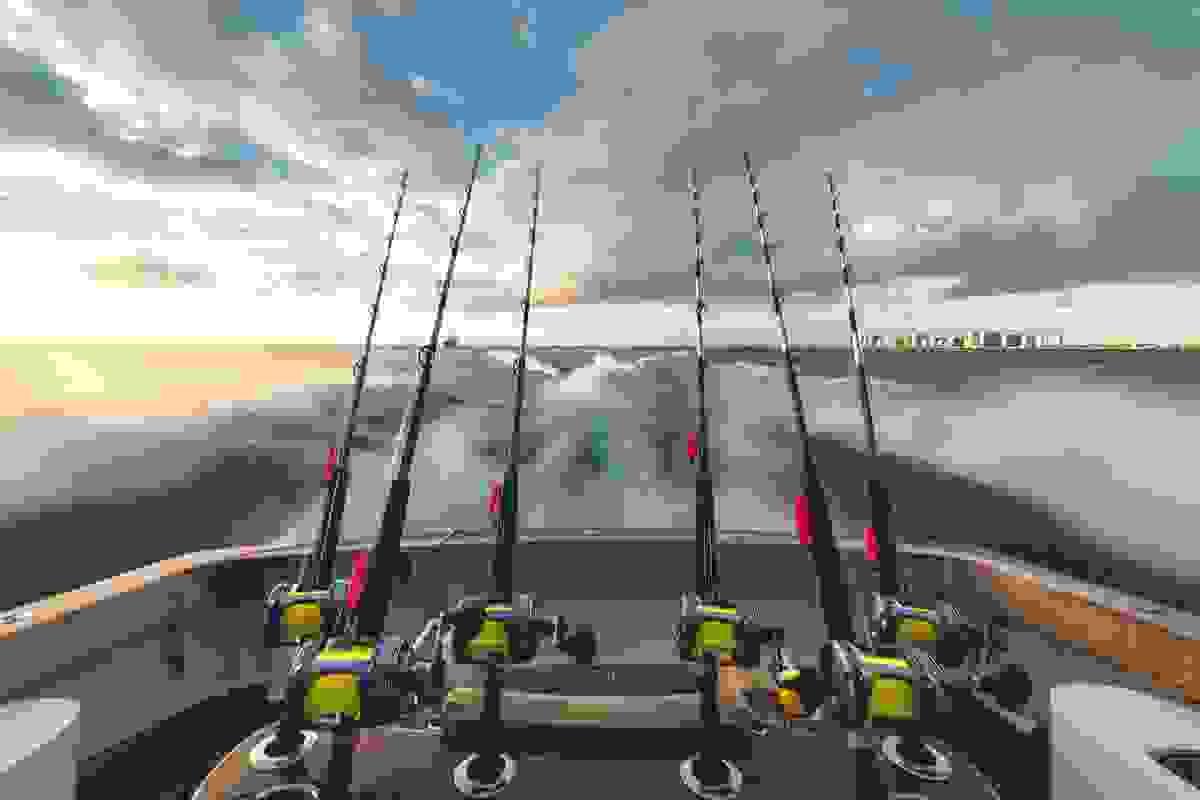 Fishing rods on a boat at sea Fishing rods on a boat at sea