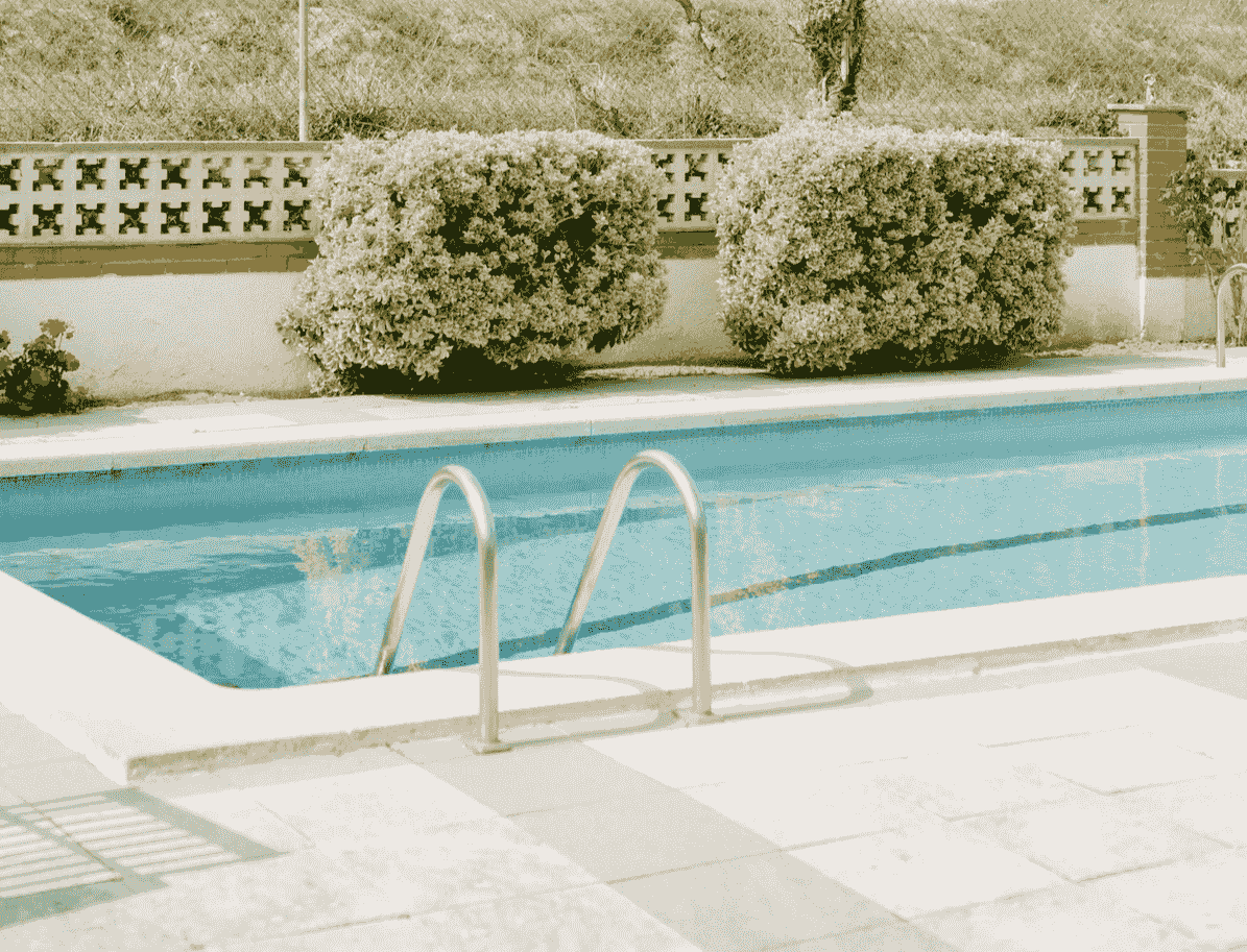 Beautiful decorative block fence surrounding a pool in Avondale AZ