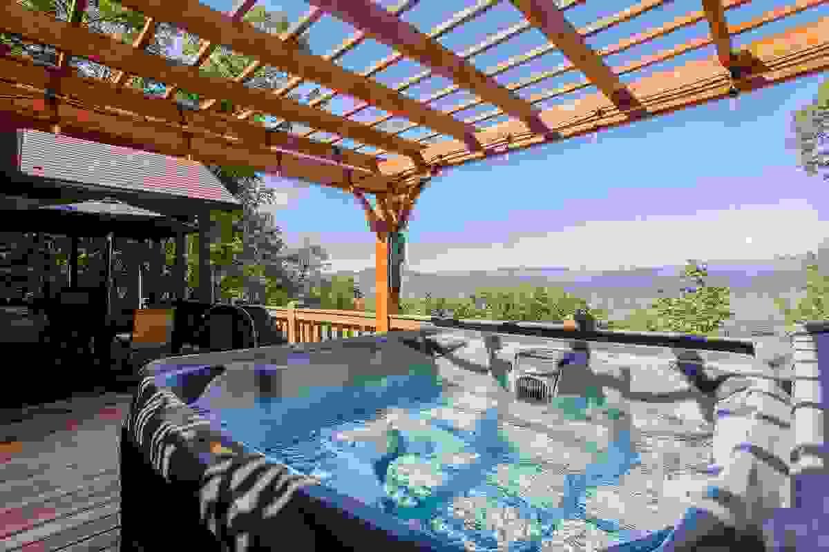 Hot Tub under pergola with mountain view Hot Tub under pergola with mountain view