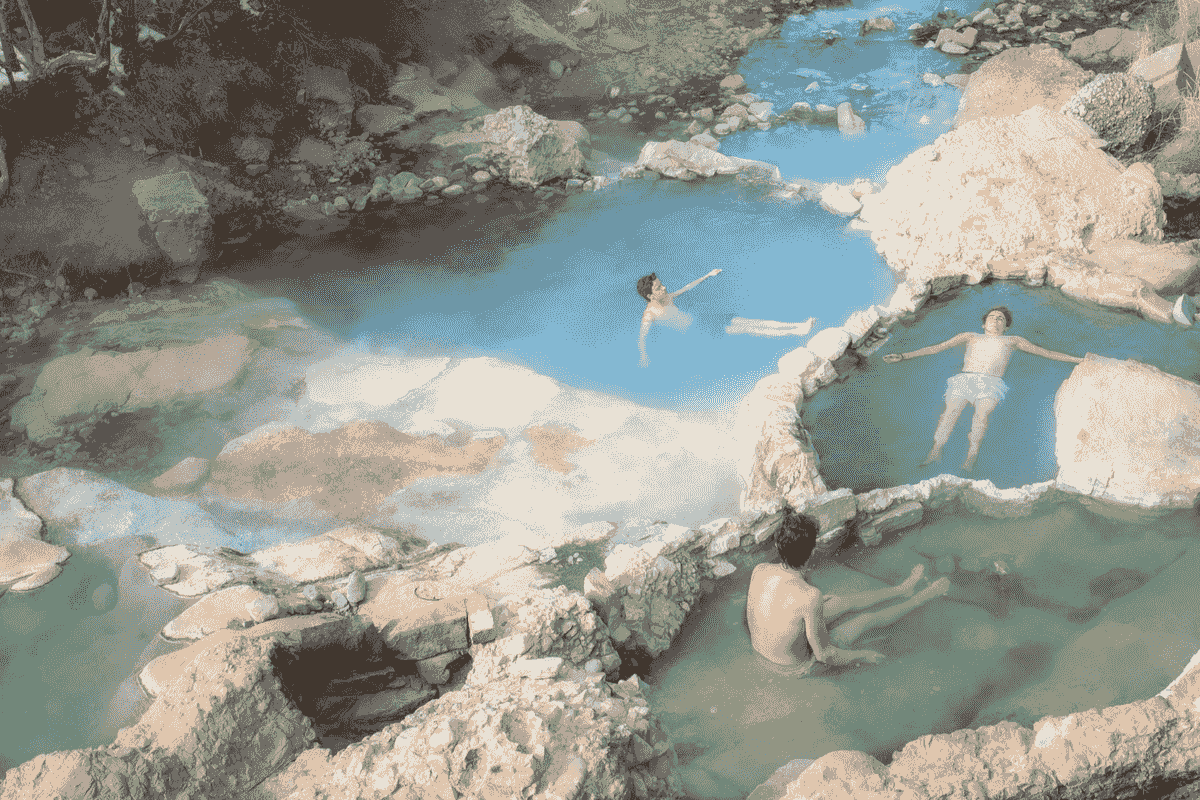 Soaking in a hot spring for health and wellness benefits