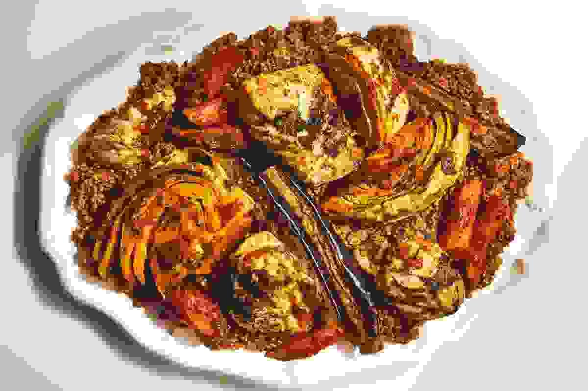 West African Jollof Rice Variations and Cooking Competi...