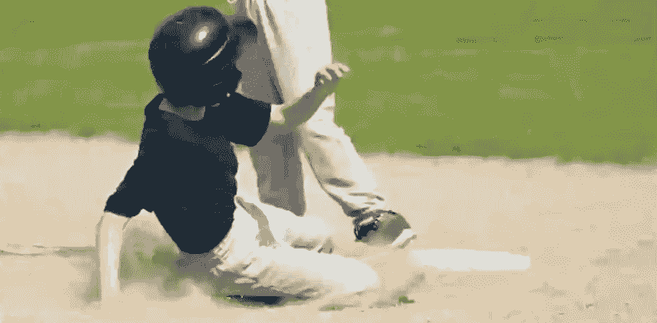 A base runner sliding into second base. A base runner sliding into second base.