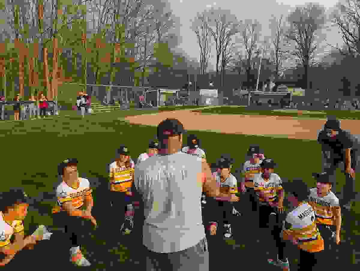 Coach JT leading the Park City Bulldogs baseball team. Coach JT leading the Park City Bulldogs baseball team.