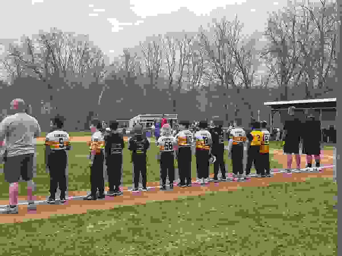 Park City Bulldogs baseball team during national anthem. Park City Bulldogs baseball team during national anthem.