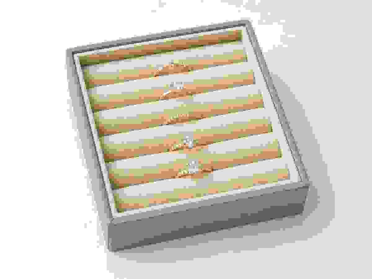 EVA insert for jewelry packaging shown in factory environment, providing precise fit and secure protection for rings, necklaces, and delicate fashion accessories. EVA insert for jewelry packaging shown in factory environment, providing precise fit and secure protection for rings, necklaces, and delicate fashion accessories.