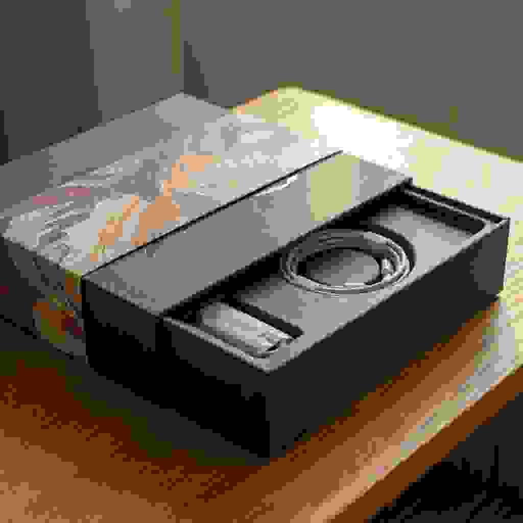 High-end consumer electronics packaging showcasing a premium unboxing experience with a rigid box and refined finish. High-end consumer electronics packaging showcasing a premium unboxing experience with a rigid box and refined finish.