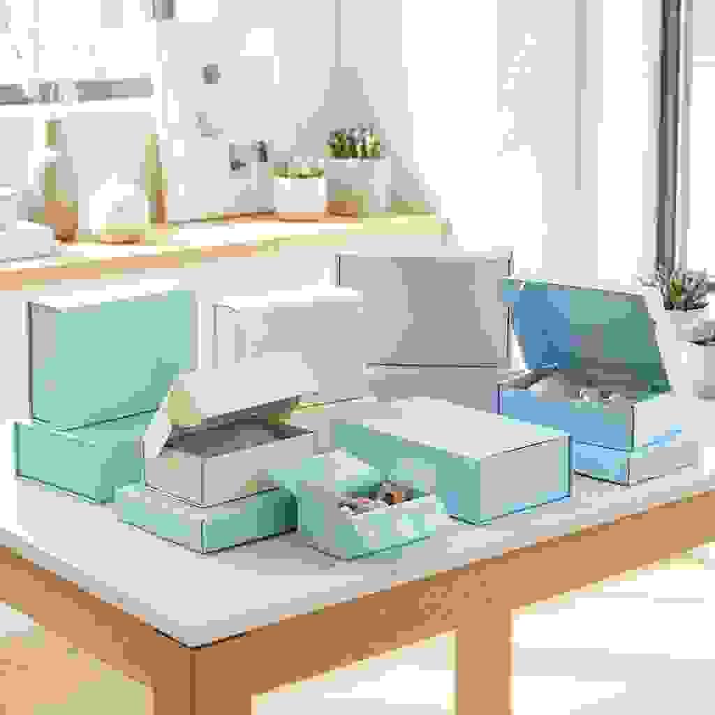 Mixed toy and gift packaging styles including rigid boxes, folding cartons, and mailer boxes for retail and e-commerce. Mixed toy and gift packaging styles including rigid boxes, folding cartons, and mailer boxes for retail and e-commerce.