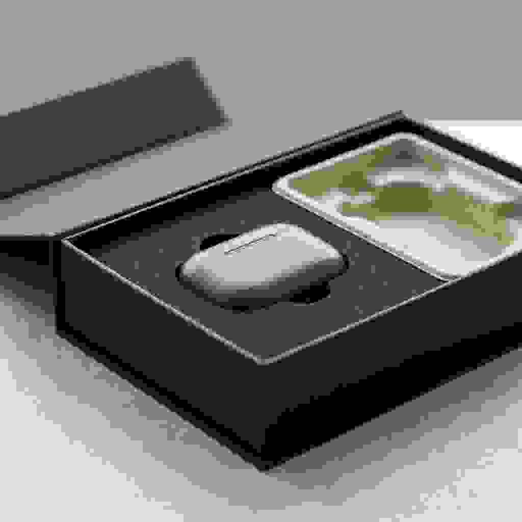 Premium rigid box for consumer electronics with a precision custom insert holding the device securely in place. Premium rigid box for consumer electronics with a precision custom insert holding the device securely in place.