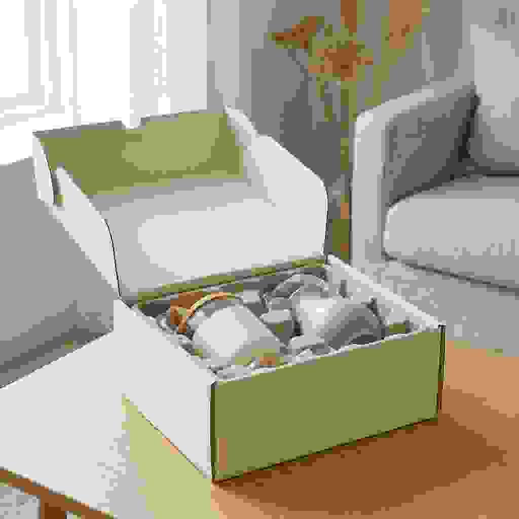 Protective rigid box packaging with custom insert for fragile home décor items like ceramics and glass candle jars. Protective rigid box packaging with custom insert for fragile home décor items like ceramics and glass candle jars.