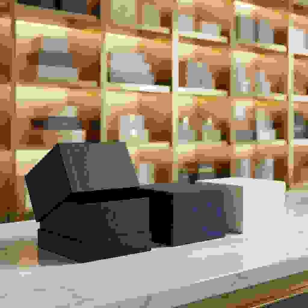 Telescoping rigid boxes with deep full-cover lids, showing a tight overlap between lid and base. Telescoping rigid boxes with deep full-cover lids, showing a tight overlap between lid and base.