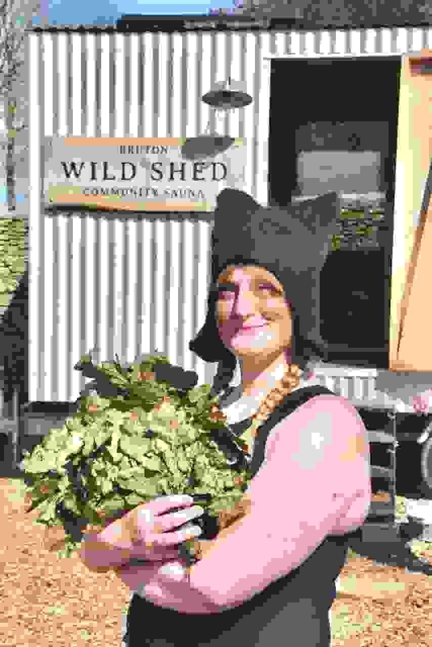 Sauna svend Emilie Joy Rowell outside a sauna wearing her handmade woolen sauna hat. Sauna svend Emilie Joy Rowell outside a sauna wearing her handmade woolen sauna hat.
