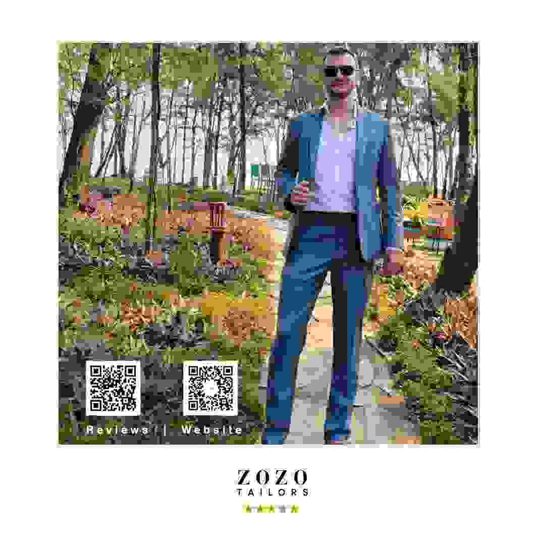 Classic blue suit: crisp shirt Person wearing a mid-blue tailored suit with a crisp white shirt Classic blue suit: crisp shirt Person wearing a mid-blue tailored suit with a crisp white shirt
