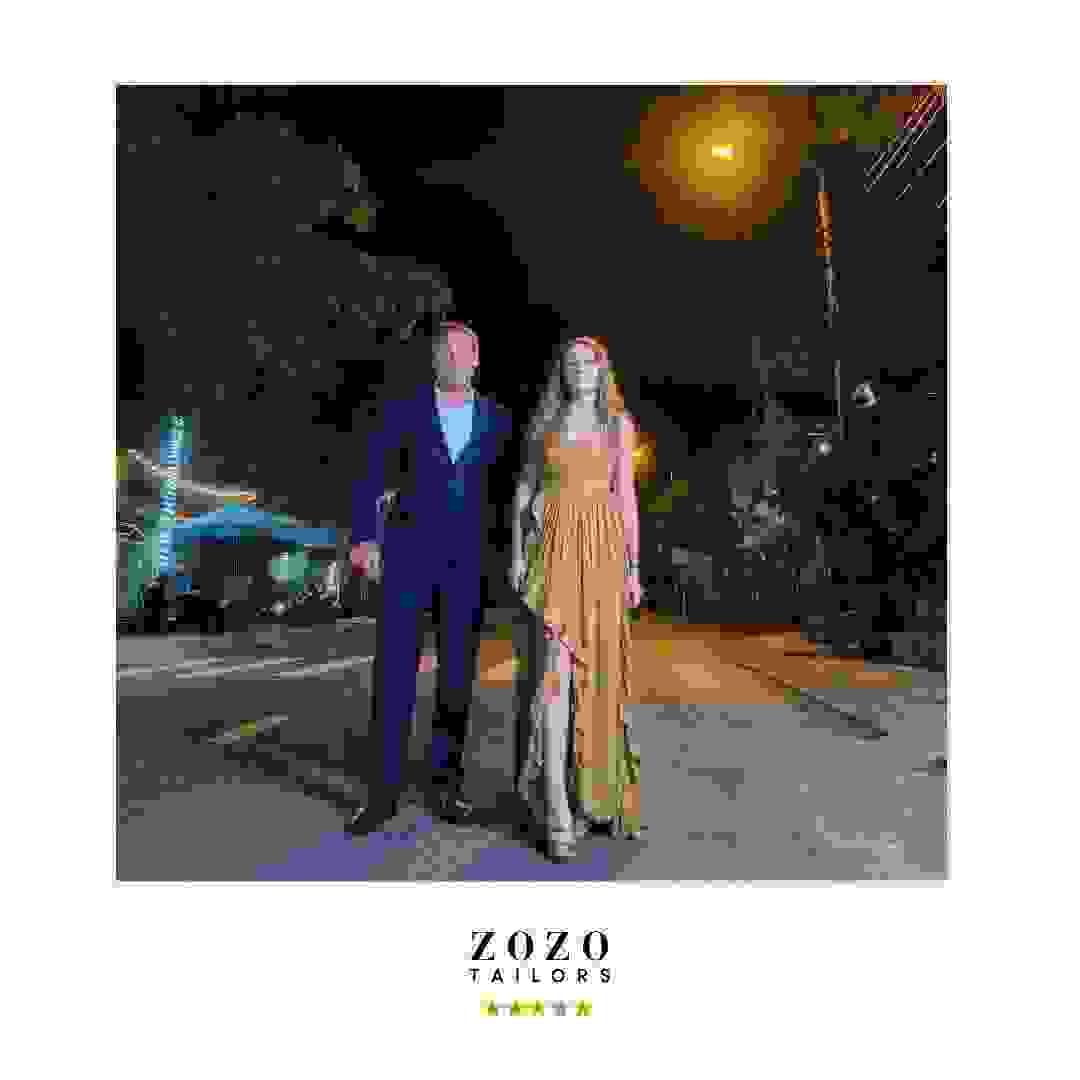 Teen in a formal evening gown and dad in a formal suit, ready for a special event Teen in a formal evening gown and dad in a formal suit, ready for a special event