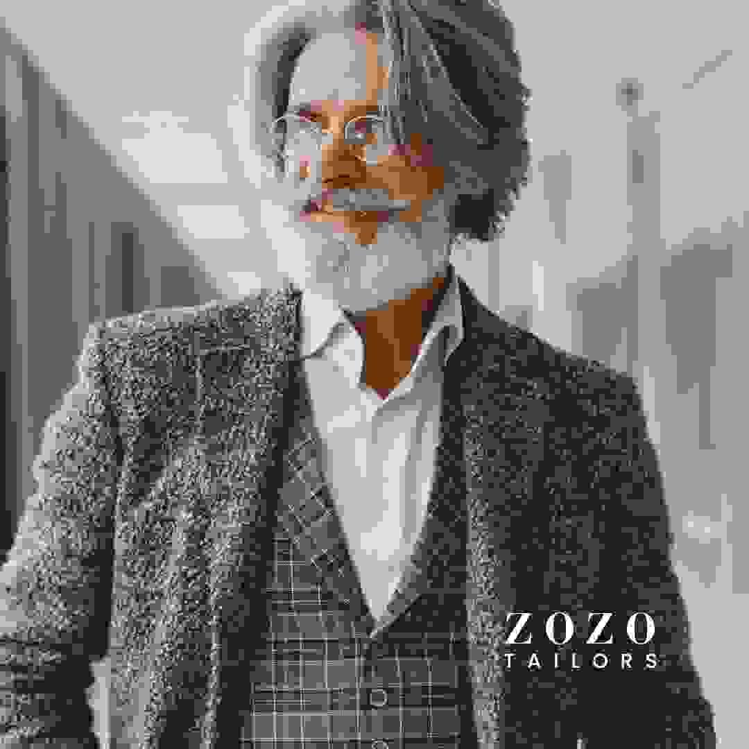 Professional man in a tailored suit and waistcoat — reflecting the personal and professional presence that comes from expert fit and individual style.