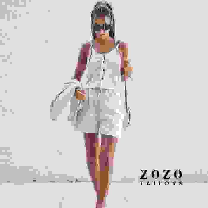 Cream linen shorts and jacket with summery top — the natural fabric and fit gives a feeling of cool style on hot summer days.