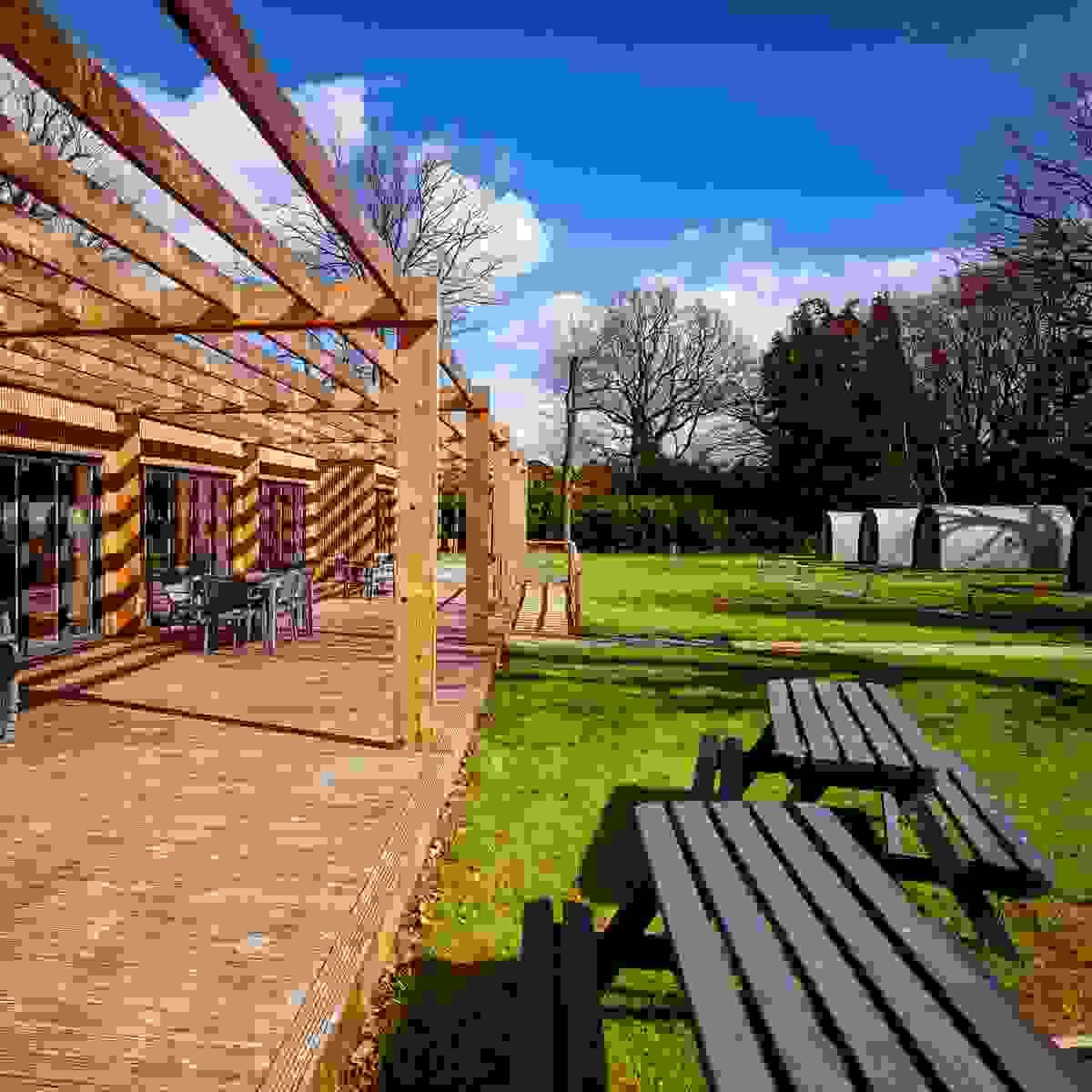 Looking along the decking towards the pods Looking along the decking towards the pods