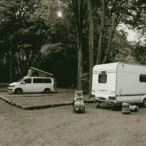 Campervan and Caravan on their pitches Campervan and Caravan on their pitches