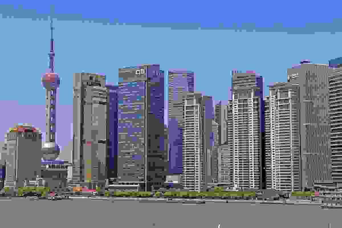 Shanghai Pudong skyline across the Huangpu River — Mussi Katz, CC0. Shanghai Pudong skyline across the Huangpu River — Mussi Katz, CC0.