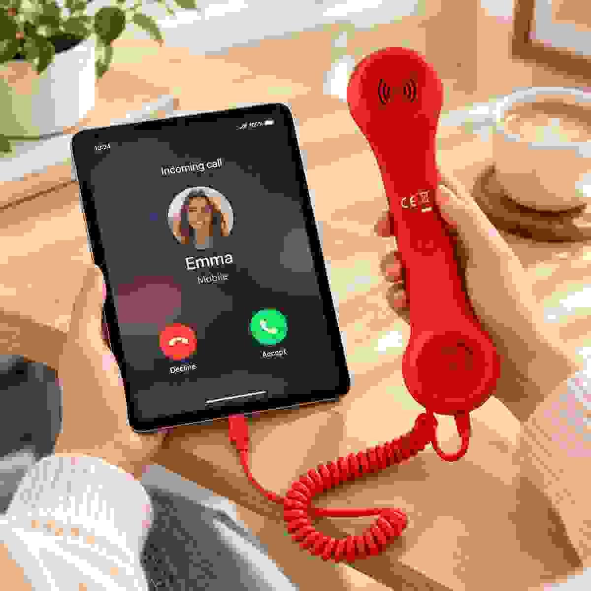 Red 3289 USB Type-C retro phone handset used with an iPad for voice calls in a warm lifestyle setting Red 3289 USB Type-C retro phone handset used with an iPad for voice calls in a warm lifestyle setting
