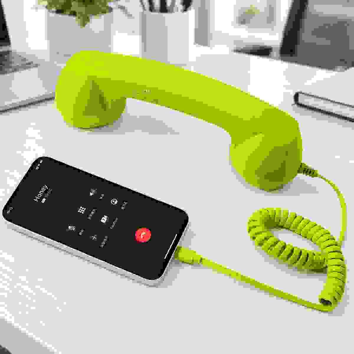 Retro phone handset connected to a smartphone for voice calling Retro phone handset connected to a smartphone for voice calling